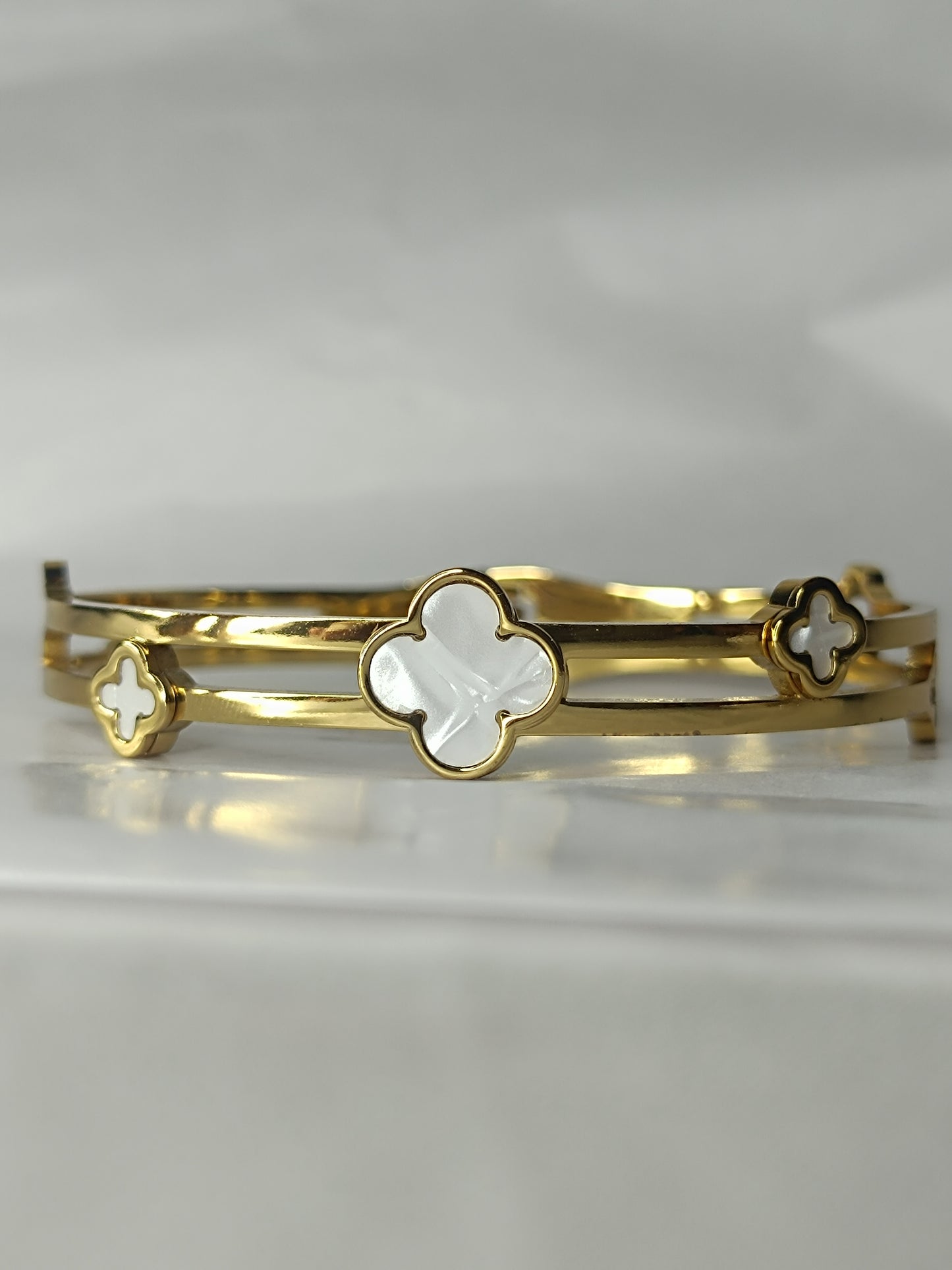 Elegant Clover Charm Gold Bangle